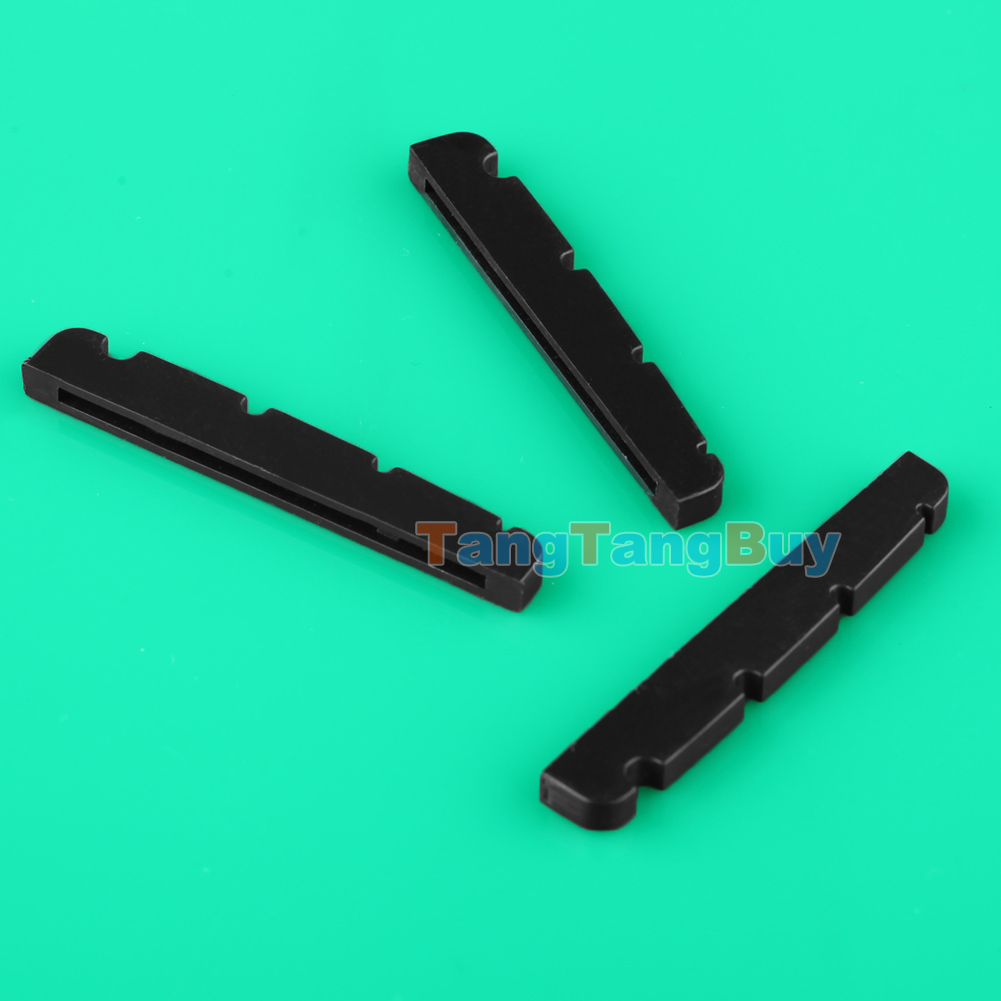 Bass guitar nut slots