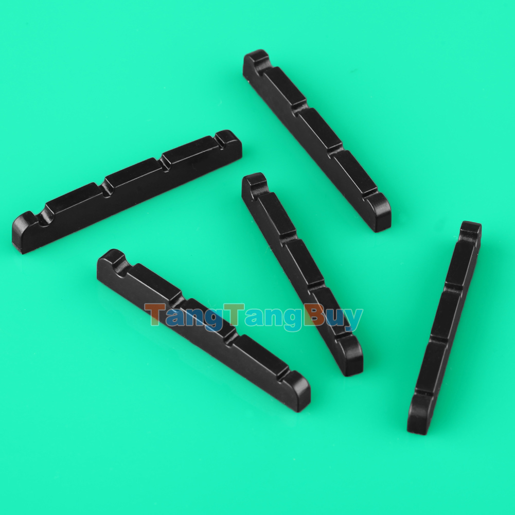 Bass guitar nut slots